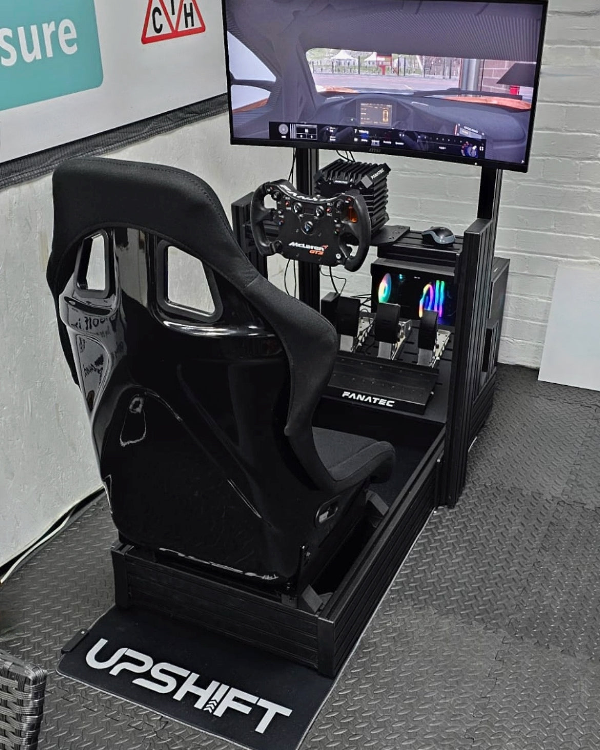 R-MAX Black Edition 160x40 Sim Rig, GTS Bucket Seat, Fanatec CSL DD with McLaren Steering Wheel, R-Single Monitor Stand, Upshift RGB Sim Rig Mat